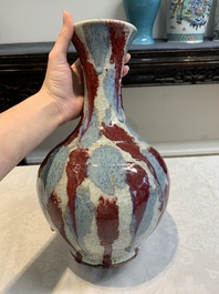 A Chinese flamb&eacute;-glazed ge-type-ground bottle vase, 19th C.