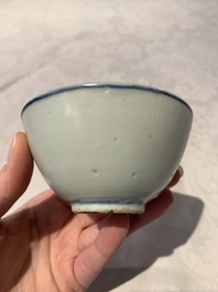 Four Chinese blue and white bowls, two cups and a plate, Ming