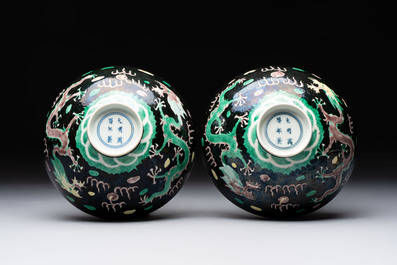 A pair of Chinese famille noire 'dragon' bowls, Wanli mark, 19th C.