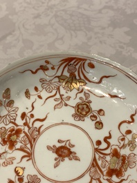 A Chinese gilt iron-red saucer and a blue and white saucer, Johanneum marks, ex-collection of August the Strong, Kangxi