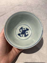Four Chinese blue and white bowls, two cups and a plate, Ming
