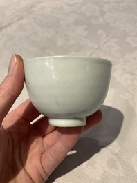 Four Chinese blue and white bowls, two cups and a plate, Ming
