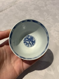 Four Chinese blue and white bowls, two cups and a plate, Ming