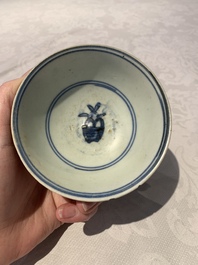 Four Chinese blue and white bowls, two cups and a plate, Ming
