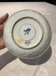 A Chinese gilt iron-red saucer and a blue and white saucer, Johanneum marks, ex-collection of August the Strong, Kangxi