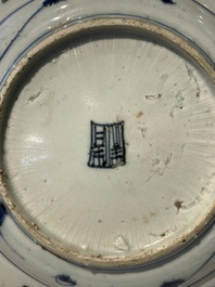 Four Chinese blue and white bowls, two cups and a plate, Ming