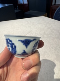 Two Chinese blue and white cups and saucers, Kangxi/Yongzheng