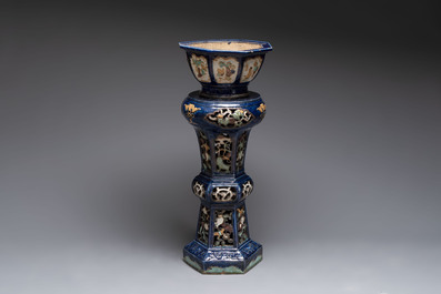 A Chinese or Vietnamese polychrome-glaze pottery jardini&egrave;re and stand, 19th C.