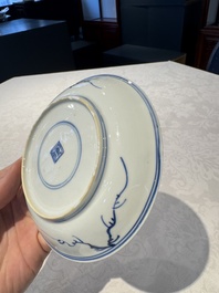 Two Chinese blue and white cups and saucers, Kangxi/Yongzheng