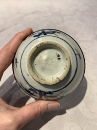 Four Chinese blue and white bowls, two cups and a plate, Ming