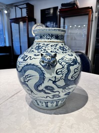 A fine Chinese blue and white 'dragon' vase with mythical-beast-shaped handles, probably Yuan