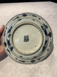 Four Chinese blue and white bowls, two cups and a plate, Ming