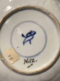 A Chinese gilt iron-red saucer and a blue and white saucer, Johanneum marks, ex-collection of August the Strong, Kangxi