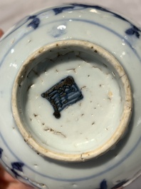 Four Chinese blue and white bowls, two cups and a plate, Ming
