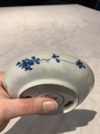 A Chinese gilt iron-red saucer and a blue and white saucer, Johanneum marks, ex-collection of August the Strong, Kangxi