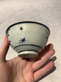 Four Chinese blue and white bowls, two cups and a plate, Ming