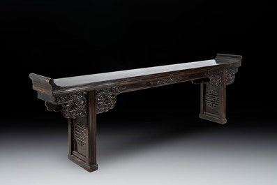 A massive Chinese red-and-black-lacquered altar table, 'qiaotouan', Qing