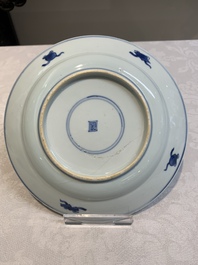 A pair of Chinese blue and white 'dragon' plates and a plate with narrative design, Yuzhen mark, Kangxi/Yongzheng