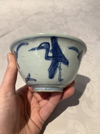Four Chinese blue and white bowls, two cups and a plate, Ming