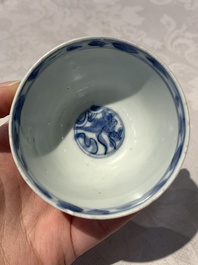 Four Chinese blue and white bowls, two cups and a plate, Ming