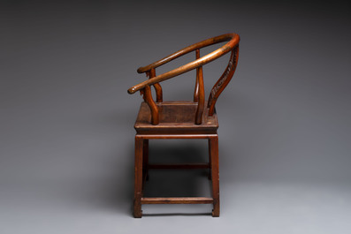 A pair of Chinese wooden 'horseshoe' chairs, 19/20th C.