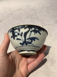 Four Chinese blue and white bowls, two cups and a plate, Ming