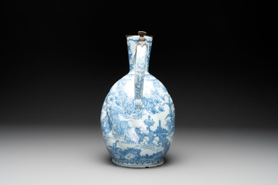 A large blue and white Dutch Delft chinoiserie jug with a mounted pewter lid, 17th C.