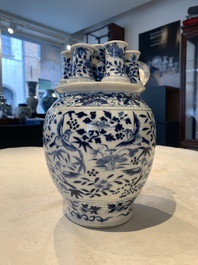A rare Chinese blue and white crocus-shaped vase with birds among flowers, Kangxi mark, 19th C.