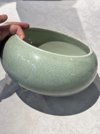 A Chinese celadon-glazed tripod censer with 'anhua' floral design, Kangxi