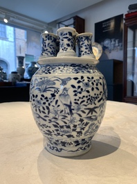A rare Chinese blue and white crocus-shaped vase with birds among flowers, Kangxi mark, 19th C.