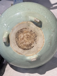 A Chinese celadon-glazed tripod censer with 'anhua' floral design, Kangxi