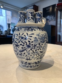 A rare Chinese blue and white crocus-shaped vase with birds among flowers, Kangxi mark, 19th C.