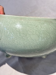 A Chinese celadon-glazed tripod censer with 'anhua' floral design, Kangxi