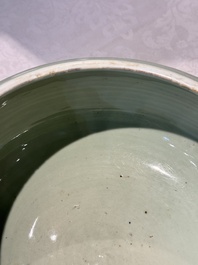 A Chinese celadon-glazed tripod censer with 'anhua' floral design, Kangxi