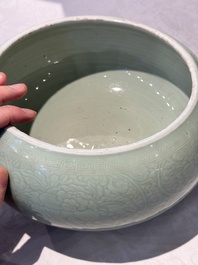 A Chinese celadon-glazed tripod censer with 'anhua' floral design, Kangxi