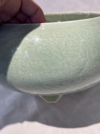 A Chinese celadon-glazed tripod censer with 'anhua' floral design, Kangxi