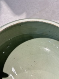 A Chinese celadon-glazed tripod censer with 'anhua' floral design, Kangxi