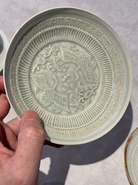 A pair of Chinese qingbai 'crane' plates and a tea bowl with stand, Song/Yuan