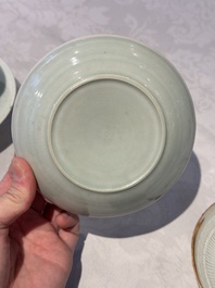 A pair of Chinese qingbai 'crane' plates and a tea bowl with stand, Song/Yuan