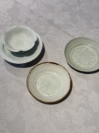 A pair of Chinese qingbai 'crane' plates and a tea bowl with stand, Song/Yuan
