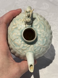 A pair of Chinese qingbai ewers and covers with dragon-form handles, Song/Yuan