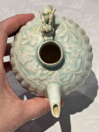 A pair of Chinese qingbai ewers and covers with dragon-form handles, Song/Yuan