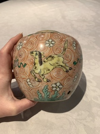 A Chinese wucai 'flying horse' jar, a green-enamelled yellow-ground 'dragon' vase and a Nanking crackle-glazed jar, 19th C.