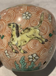 A Chinese wucai 'flying horse' jar, a green-enamelled yellow-ground 'dragon' vase and a Nanking crackle-glazed jar, 19th C.