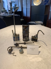 Three Chinese water pipes, two mouth pieces and a cloisonn&eacute; opium box and cover, 19th C.