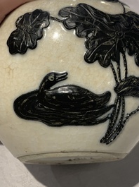 A Chinese wucai 'flying horse' jar, a green-enamelled yellow-ground 'dragon' vase and a Nanking crackle-glazed jar, 19th C.