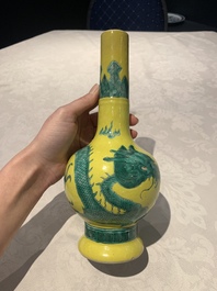 A Chinese wucai 'flying horse' jar, a green-enamelled yellow-ground 'dragon' vase and a Nanking crackle-glazed jar, 19th C.