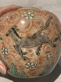 A Chinese wucai 'flying horse' jar, a green-enamelled yellow-ground 'dragon' vase and a Nanking crackle-glazed jar, 19th C.