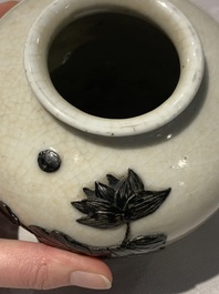 A Chinese wucai 'flying horse' jar, a green-enamelled yellow-ground 'dragon' vase and a Nanking crackle-glazed jar, 19th C.