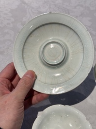 A pair of Chinese qingbai 'crane' plates and a tea bowl with stand, Song/Yuan